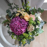 FLORISTENS VAL- BUKETT